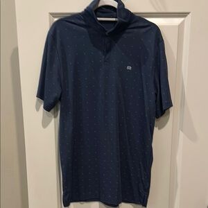 Men's navy Travis Mathew golf shirt. Size large. Blue and grey diamond print